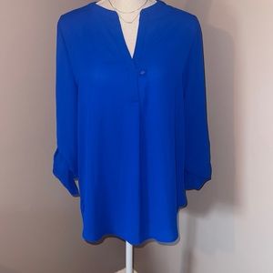 *Woman’s long sleeve blouse